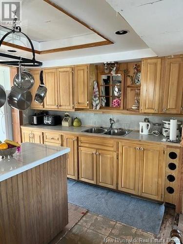 501 Queen Street, Dalhousie, NB - Indoor Photo Showing Kitchen With Double Sink