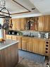 501 Queen Street, Dalhousie, NB  - Indoor Photo Showing Kitchen With Double Sink 