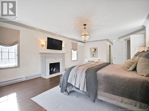 250 Dickson Boulevard, Moncton, NB - Indoor Photo Showing Bedroom With Fireplace