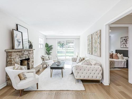 316 Cherokee Blvd, Toronto, ON - Indoor Photo Showing Living Room With Fireplace