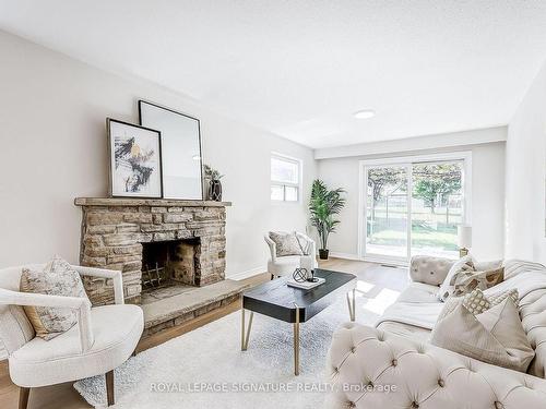 316 Cherokee Blvd, Toronto, ON - Indoor Photo Showing Living Room With Fireplace