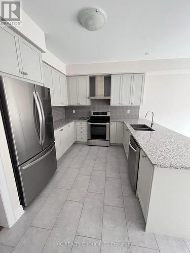 24 Cafaro Lane, Markham, ON - Indoor Photo Showing Kitchen With Double Sink With Upgraded Kitchen