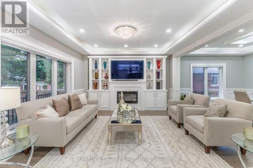 85 Oakridge Drive, Toronto, ON - Indoor Photo Showing Living Room With Fireplace