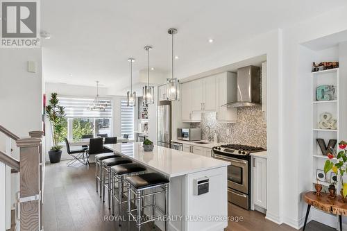 8 - 70 Thomas Mulholland Drive, Toronto, ON - Indoor Photo Showing Kitchen With Stainless Steel Kitchen With Upgraded Kitchen