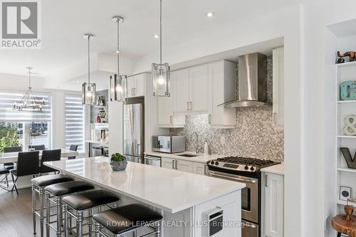 8 - 70 Thomas Mulholland Drive, Toronto, ON - Indoor Photo Showing Kitchen With Stainless Steel Kitchen With Upgraded Kitchen