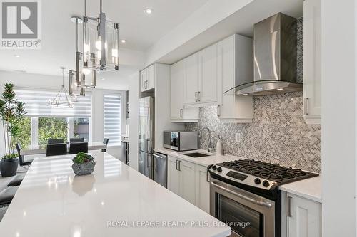 8 - 70 Thomas Mulholland Drive, Toronto, ON - Indoor Photo Showing Kitchen With Stainless Steel Kitchen With Upgraded Kitchen