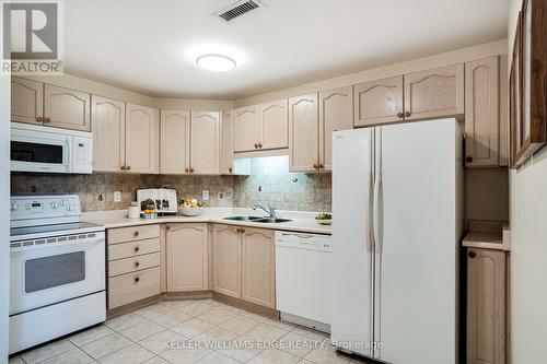 410 - 2085 Amherst Heights Drive, Burlington, ON - Indoor Photo Showing Kitchen With Double Sink