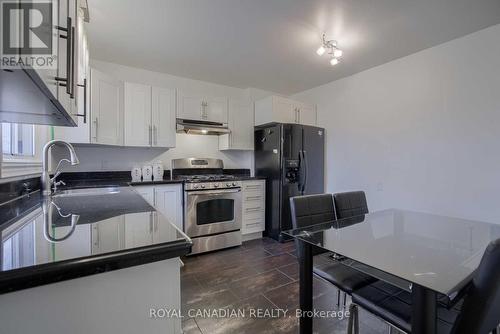 571 West 5Th Street, Hamilton, ON - Indoor Photo Showing Kitchen With Double Sink