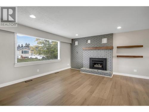 4393 Fisk Avenue, Prince George, BC - Indoor Photo Showing Living Room With Fireplace