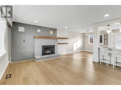 4393 Fisk Avenue, Prince George, BC - Indoor Photo Showing Living Room With Fireplace