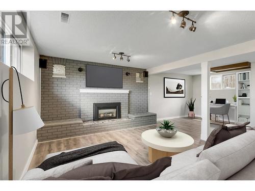 4393 Fisk Avenue, Prince George, BC - Indoor Photo Showing Living Room With Fireplace