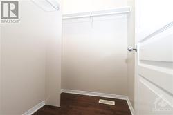 Primary bedroom 1st walk- in closet - 