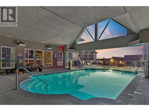 1088 Sunset Drive Unit# 535, Kelowna, BC - Indoor Photo Showing Other Room With In Ground Pool