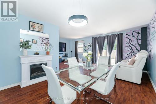 B11 - 427 Victoria Road N, Guelph, ON - Indoor Photo Showing Dining Room With Fireplace