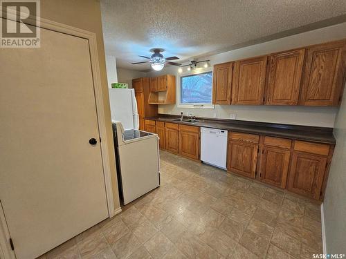 609 1St Street W, Meadow Lake, SK - Indoor Photo Showing Kitchen With Double Sink