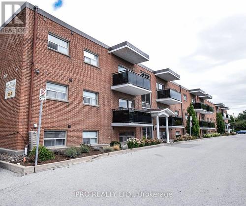 209 - 264 Oakdale Avenue, St. Catharines, ON - Outdoor With Balcony With Facade