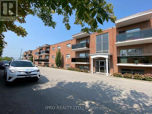 209 - 264 Oakdale Avenue, St. Catharines, ON - Outdoor With Balcony With Facade