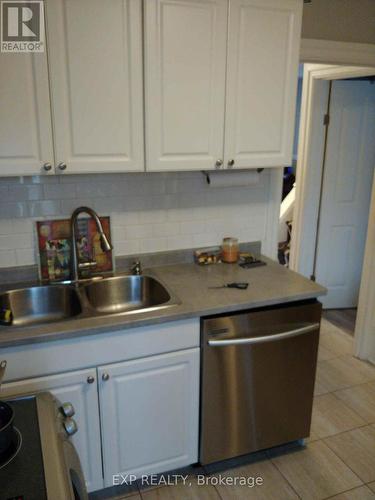 Upper - 129 Grant Avenue, Hamilton, ON - Indoor Photo Showing Kitchen With Double Sink