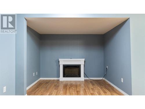 2740 25Th Avenue Ne, Salmon Arm, BC - Indoor Photo Showing Living Room With Fireplace