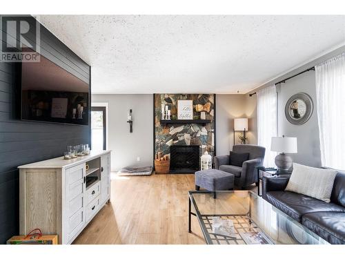 2740 25Th Avenue Ne, Salmon Arm, BC - Indoor Photo Showing Living Room With Fireplace