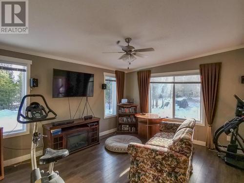 3000 Maze-Forbes Fs Road, Lac La Hache, BC - Indoor Photo Showing Living Room With Fireplace