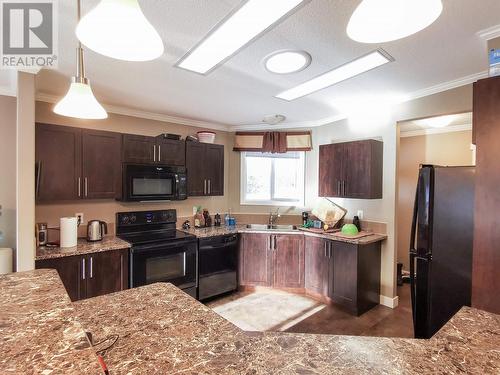 3000 Maze-Forbes Fs Road, Lac La Hache, BC - Indoor Photo Showing Kitchen With Double Sink