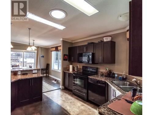 3000 Maze-Forbes Fs Road, Lac La Hache, BC - Indoor Photo Showing Kitchen With Double Sink