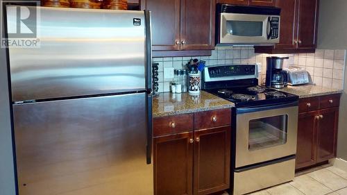 300 Bighorn Boulevard Unit# 324, Radium Hot Springs, BC - Indoor Photo Showing Kitchen With Stainless Steel Kitchen