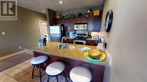 300 Bighorn Boulevard Unit# 324, Radium Hot Springs, BC - Indoor Photo Showing Kitchen With Double Sink