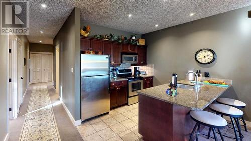 300 Bighorn Boulevard Unit# 324, Radium Hot Springs, BC - Indoor Photo Showing Kitchen With Stainless Steel Kitchen