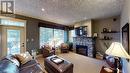 300 Bighorn Boulevard Unit# 324, Radium Hot Springs, BC  - Indoor Photo Showing Living Room With Fireplace 