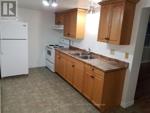 203 Isabella Street, Pembroke, ON - Indoor Photo Showing Kitchen With Double Sink