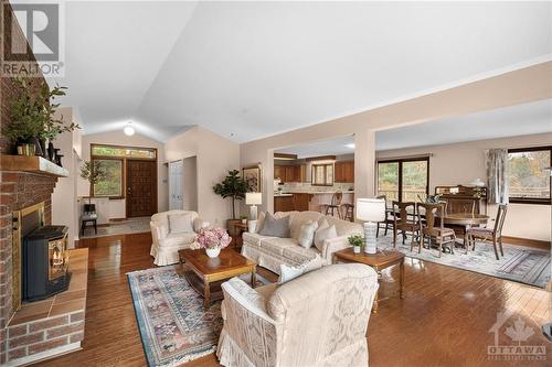 196 Indian Hill Road, Pakenham, ON - Indoor Photo Showing Living Room With Fireplace