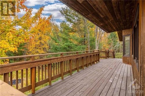 wrap around deck to the back side of home - 196 Indian Hill Road, Pakenham, ON - Outdoor With Deck Patio Veranda With Exterior