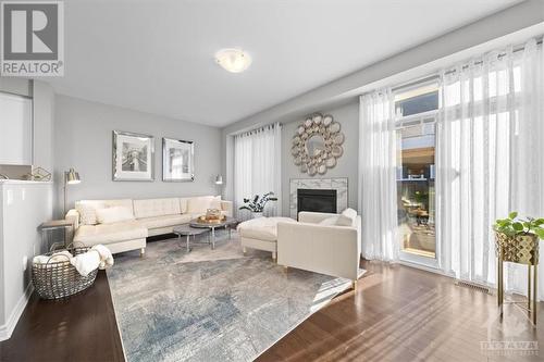 707 Vivera Place, Stittsville, ON - Indoor Photo Showing Living Room With Fireplace