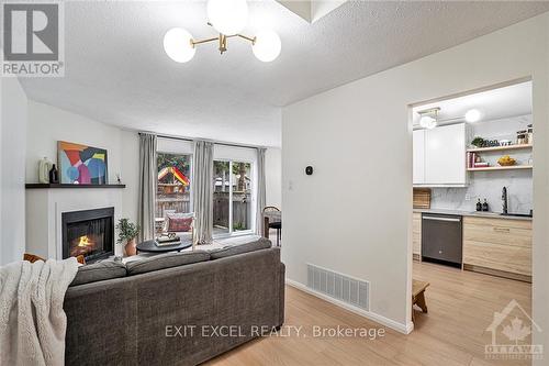 421 Valade Crescent, Ottawa, ON - Indoor Photo Showing Living Room With Fireplace