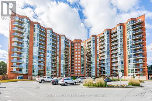 105 - 20 Dean Park Road, Toronto, ON - Outdoor With Facade