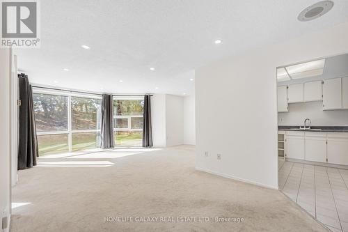 105 - 20 Dean Park Road, Toronto, ON - Indoor Photo Showing Other Room