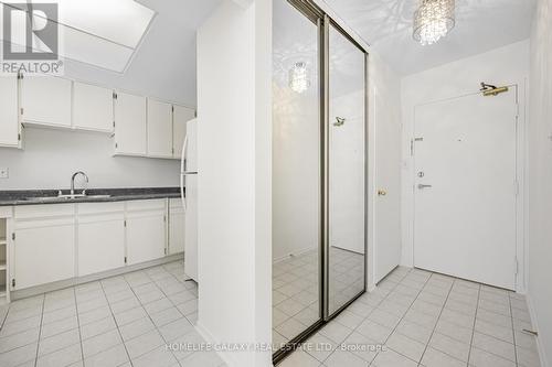 105 - 20 Dean Park Road, Toronto, ON - Indoor Photo Showing Kitchen With Double Sink