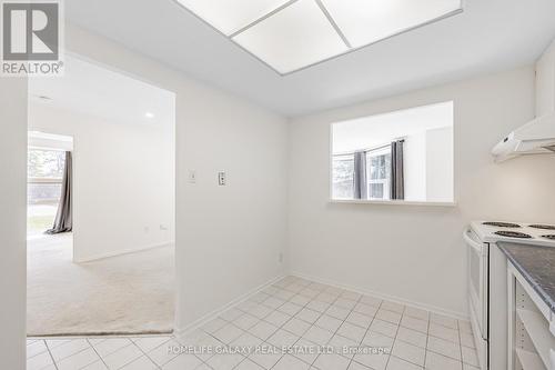 105 - 20 Dean Park Road, Toronto, ON - Indoor Photo Showing Kitchen