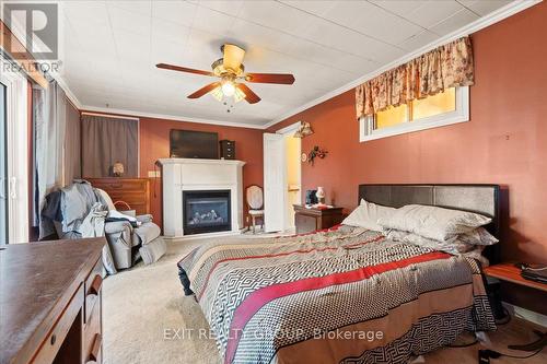 278 Riverside Parkway, Quinte West, ON - Indoor Photo Showing Bedroom With Fireplace