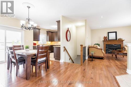 1962 Elana Drive, Severn, ON - Indoor Photo Showing Dining Room With Fireplace