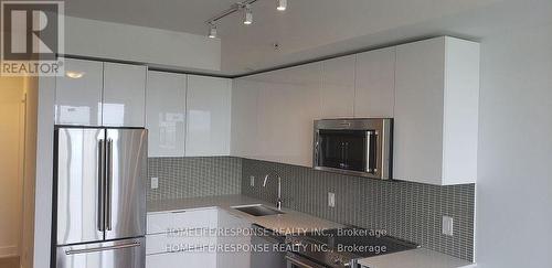 4709 - 30 Shore Breeze Drive, Toronto, ON - Indoor Photo Showing Kitchen With Upgraded Kitchen