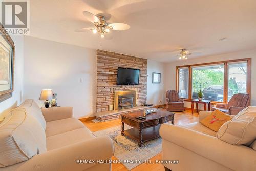 223 Bayshore Road, Innisfil, ON - Indoor Photo Showing Living Room With Fireplace