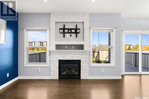 5360 Aerial Crescent, Regina, SK - Indoor Photo Showing Living Room With Fireplace