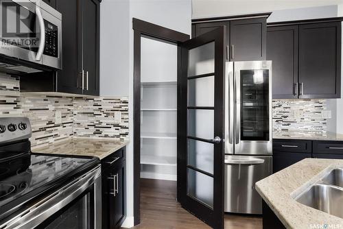 5360 Aerial Crescent, Regina, SK - Indoor Photo Showing Kitchen With Double Sink With Upgraded Kitchen