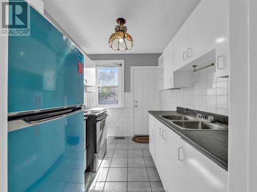 877-885 Tuscarora Street, Windsor, ON - Indoor Photo Showing Kitchen With Double Sink