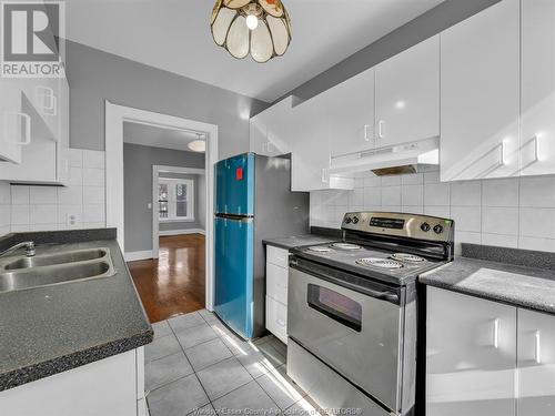 877-885 Tuscarora Street, Windsor, ON - Indoor Photo Showing Kitchen With Double Sink