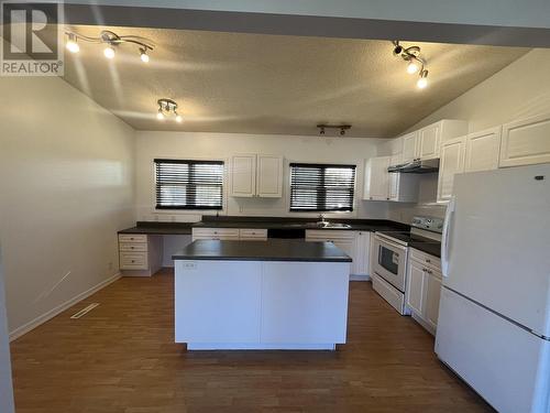 9312 112 Avenue, Fort St. John, BC - Indoor Photo Showing Kitchen With Double Sink