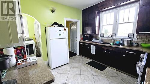 298 12Th Street E, Prince Albert, SK - Indoor Photo Showing Kitchen With Double Sink